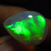 3.40 / Cts - 10x14 mm - Pear Cut Cabochon - WELO ETHIOPIAN OPAL - Amazing Green Red Mix Fire